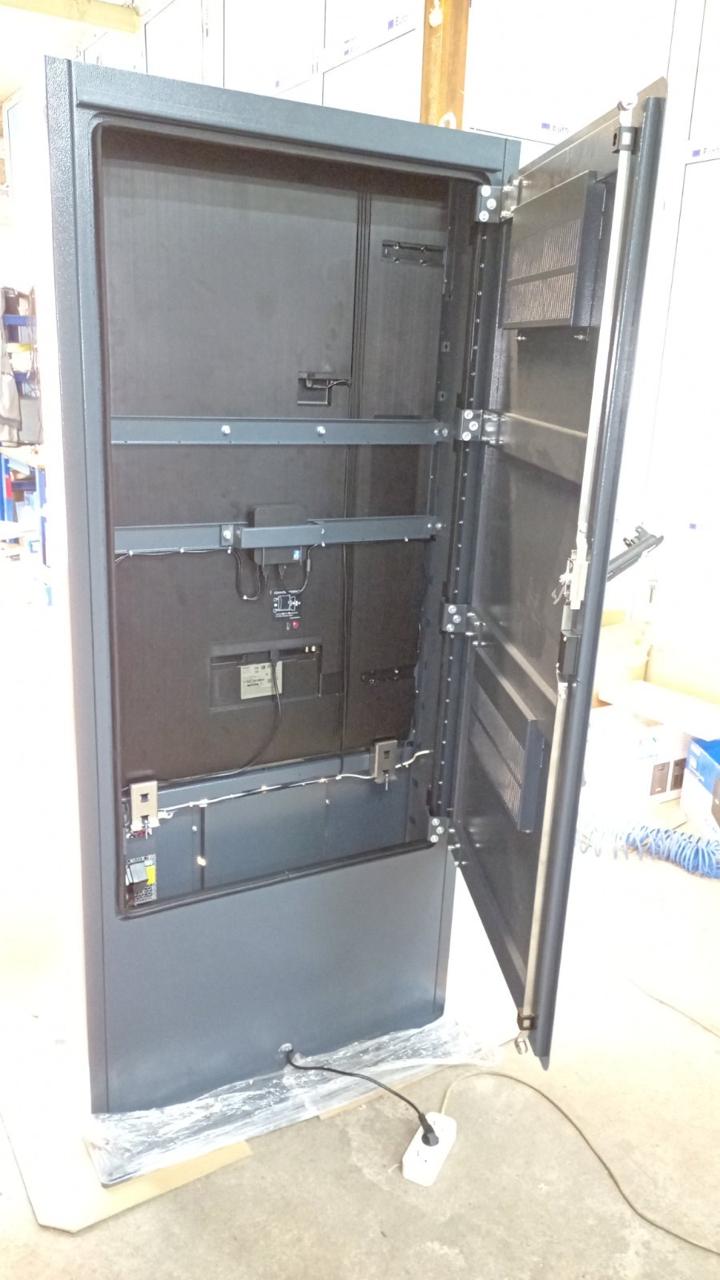 Open service bay of the QS55 terminal — access to internal components for maintenance