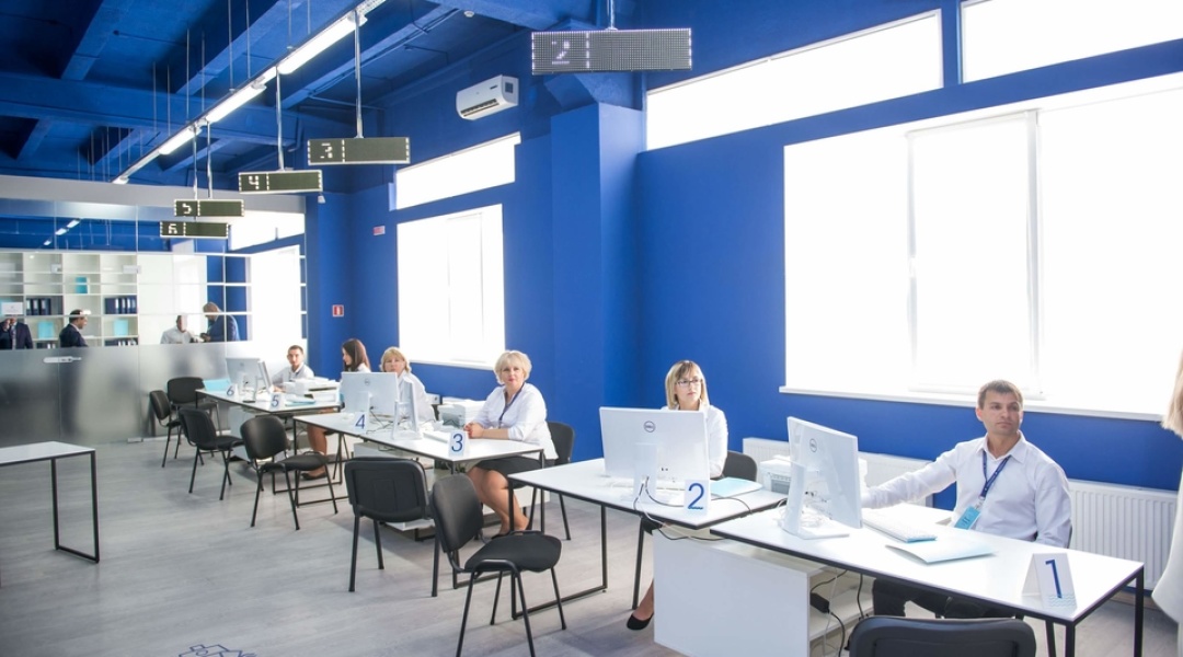 Morrichservice service hall with numbered LED counter indicators above operator desks