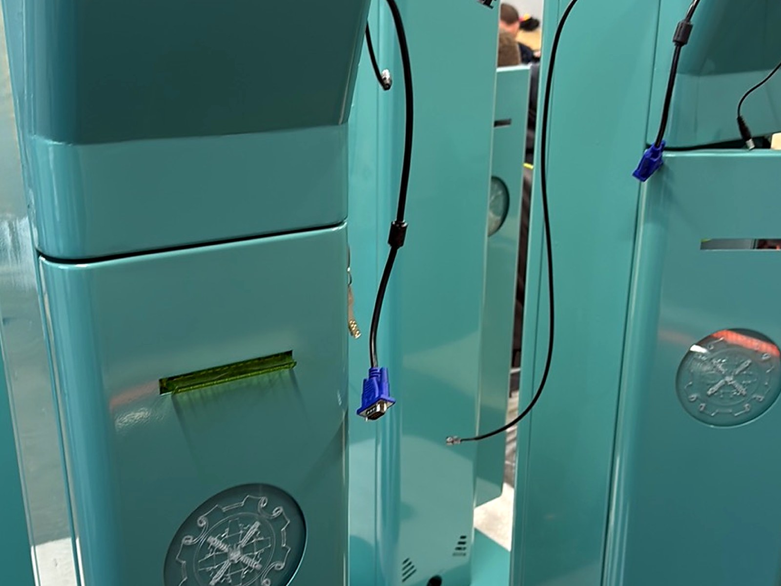 Painted QS17 enclosures with cables attached, side view