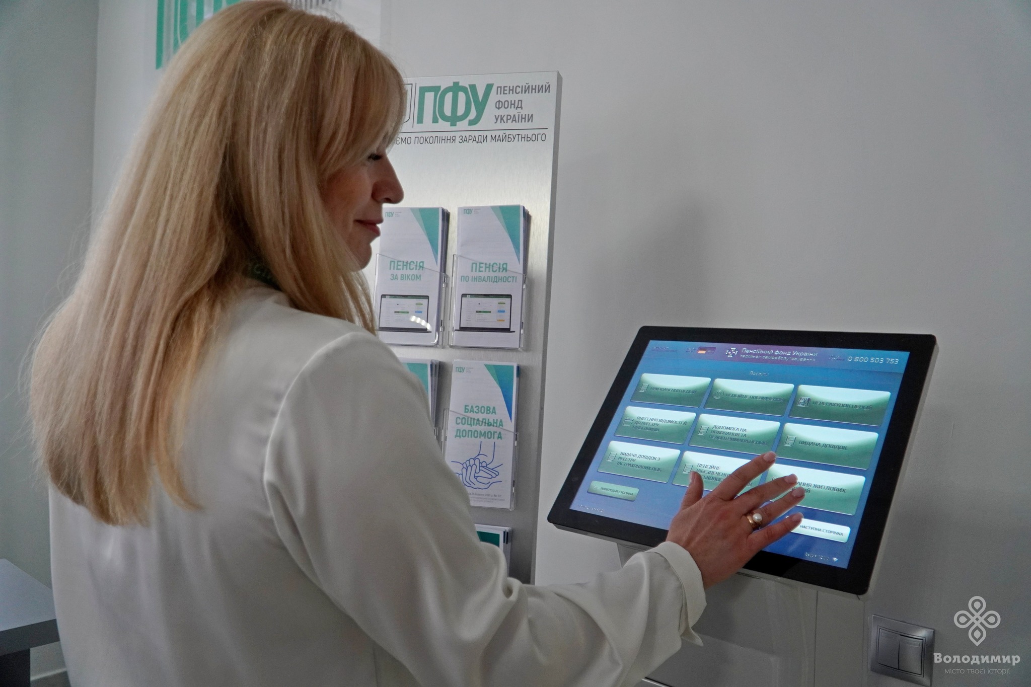 QSolutions self-service kiosk in production with custom branded interface — technical specification capability