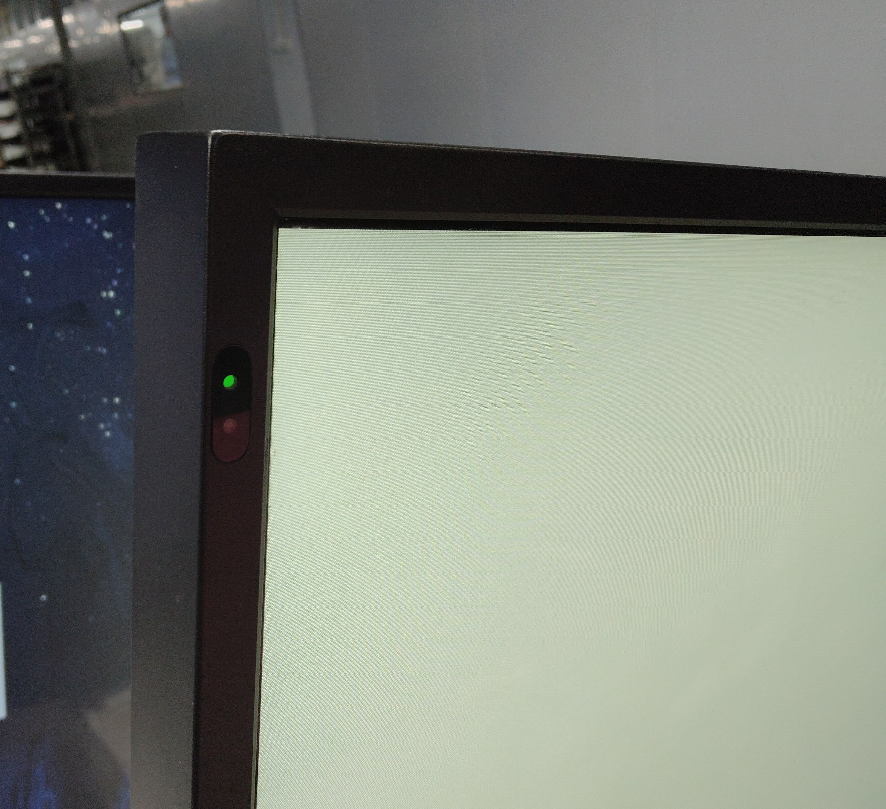 Edge of tempered glass over the touch panel